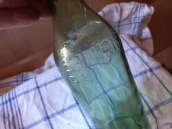 Old bottle with crystal water
