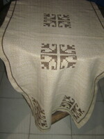 Beautiful cross-stitch embroidered woven tablecloth runner