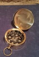 Pocket compass with brass cover