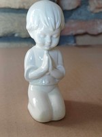 Antique porcelain praying boy