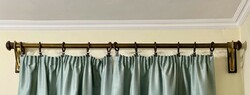 Copper cornice with antique bracket, wooden rings