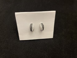 White gold earrings with clear and black diamonds