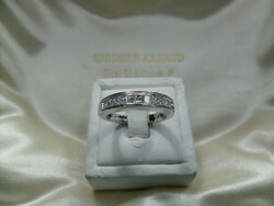 White gold ring with princess-cut bezels