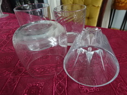 Four glass glasses, all different. Its height is 7-8 cm. He has!