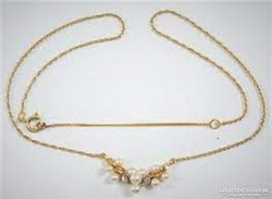 14K gold necklace with pearls and diamonds.
