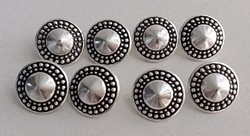 8 beautiful marked silver-plated decorative buttons.