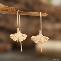 Ginkgo biloba leaf shaped earrings.