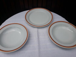 3 Lowland porcelain flat and deep plates with yellow and brown stripes