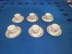 Tea or coffee cups with coasters
