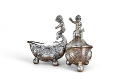 A pair of rare baroque silver figural spice holders