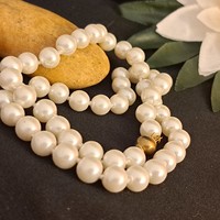 Elegant tekla string of pearls.