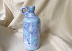 Ceramic bottle with ears