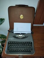 Qwertz small pica hermes baby portable typewriter