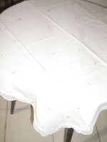 Madeira tablecloth with beautiful lacy edges and pink tulips