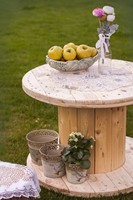 A cable drum is for sale for events, garden programs, and children's parties