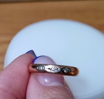 Women's gold ring with diamonds