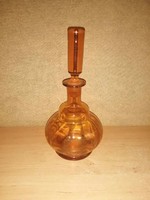 Antique amber-colored glass bottle offering drinks