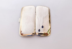 Art Nouveau women's silver cigarette case with precious stones.