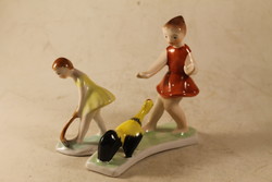 Porcelain girl with rooster and rake 923