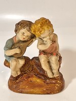 Pair of old plaster figures