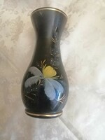 Black vase with flowers