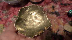 Leaf-shaped, copper ashtray or ring holder.