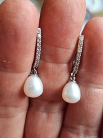 Silver, dangling pearl earrings