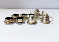 Old, miniature silver children's tea set.