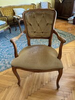 Beautiful old upholstered armchair