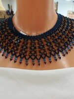 Montana blue cross-stitched pearl collar