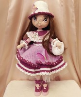 Hand-crocheted doll in a purple dress, with butterflies, a bag and a hat. 40 cm high. An excellent gift.