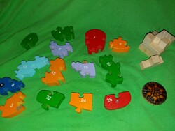 A bag of different wooden toy puzzle pieces to replace one missing as shown in the pictures