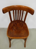 Restored antique thonet chair with floral motif seat