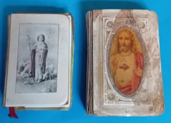 2 prayer books with bone covers