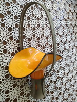 Art deco yellow glass goblet in a metal holder
