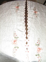 A pair of beautiful butter colored machine embroidered crumpled silk curtains