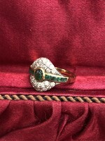 Handmade brilliant ring with emeralds