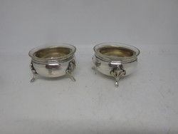 A pair of art-deco silver spice holders with original glass inserts
