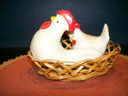 Rooster in spice basket