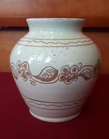 Dozen ceramic vases