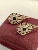 Women's earrings with a pair of diamonds and sapphires