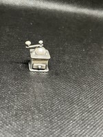 Silver miniature coffee grinder