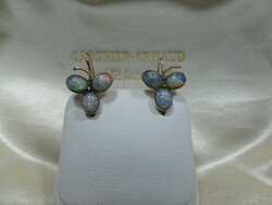 Antique gold clover earrings with a pair of opal glasses
