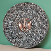 Golden copper alloy wall decoration with the motif of the priest Zoltan's day