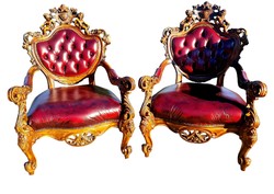 Richly carved baroque rococo leather armchairs