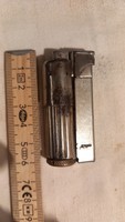 An old, interesting, marked gasoline lighter