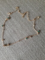 Gold-plated silver necklace with green and small white stones