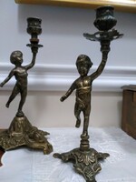 Pair of bronze candlesticks with putts