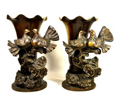 A pair of figurative bronze vases with a pair of tumbling doves
