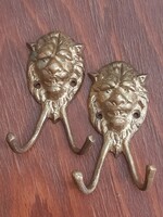 Pair of antique lion copper hangers